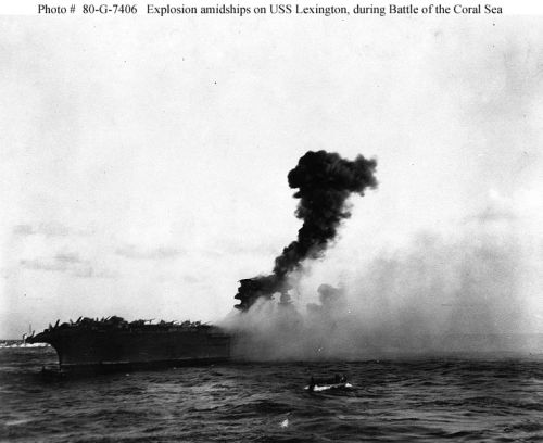 An explosion amidships on USS "Lexington" (CV-2), while she was being abandoned during the 
afternoon of 8 May 1942