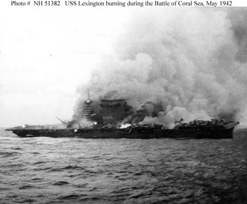 USS "Lexington" (CV-2) burning and sinking after her crew abandoned ship during the Battle of 
Coral Sea, 8 May 1942